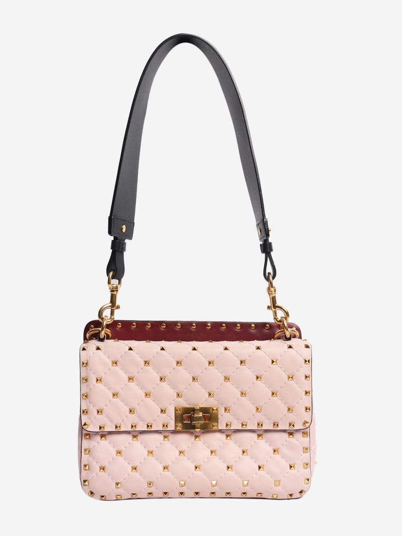 Baby pink quilted leather rockstud cross-body bag Cross-body Bags Valentino 