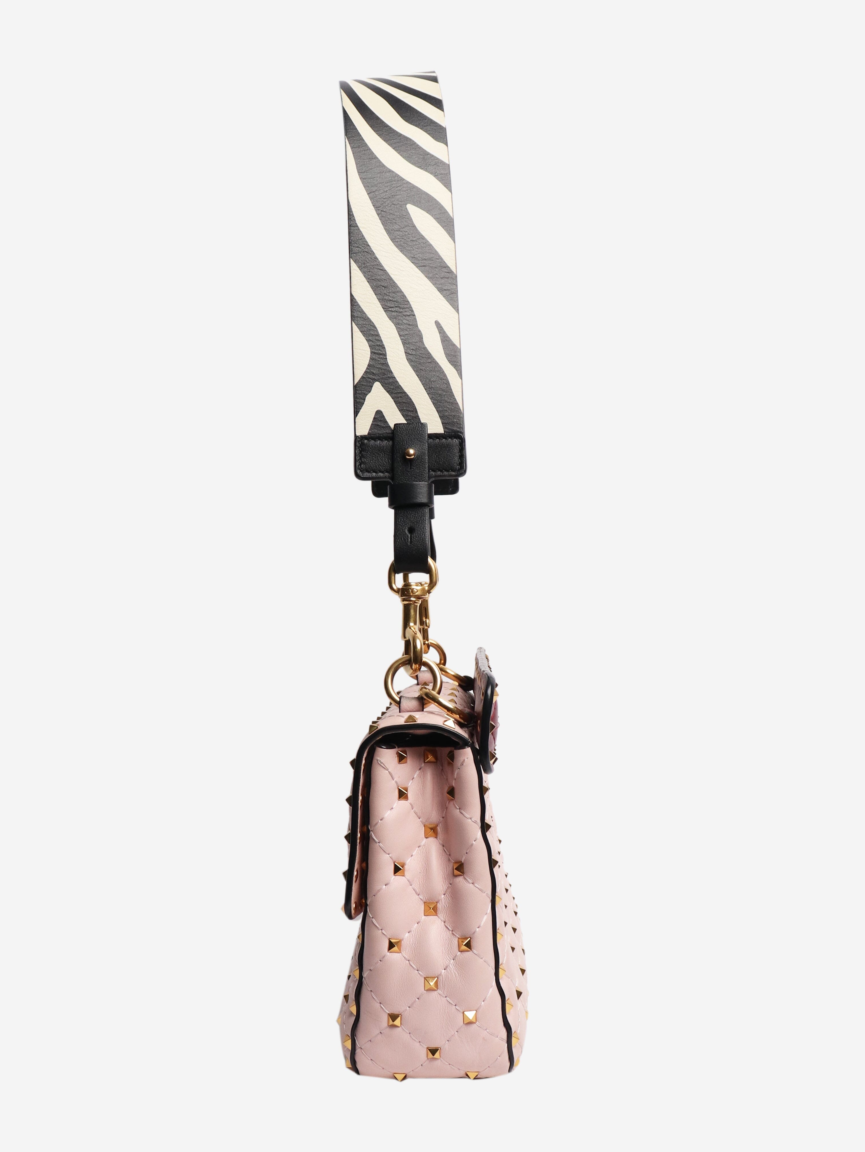 Baby pink quilted leather rockstud cross-body bag Cross-body Bags Valentino 