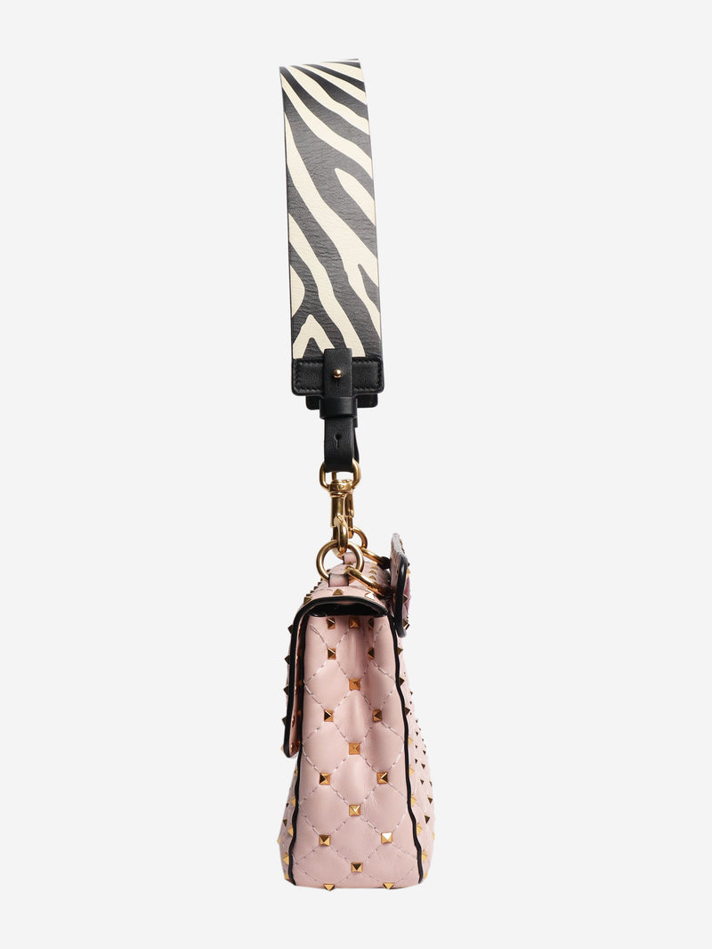 Baby pink quilted leather rockstud cross-body bag Cross-body Bags Valentino 