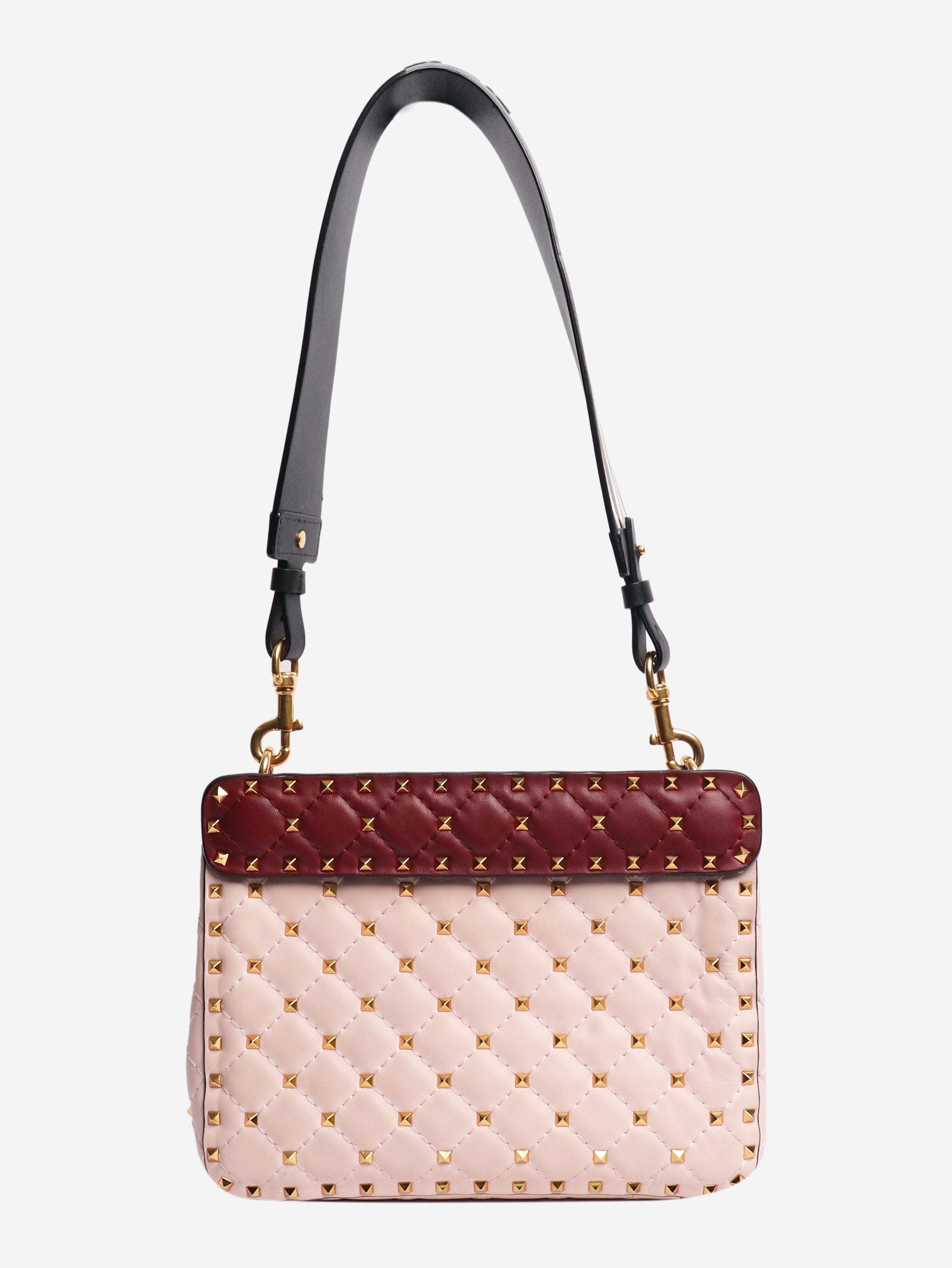 Baby pink quilted leather rockstud cross-body bag Cross-body Bags Valentino 