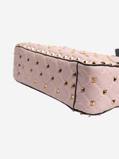 Baby pink quilted leather rockstud cross-body bag Cross-body Bags Valentino 
