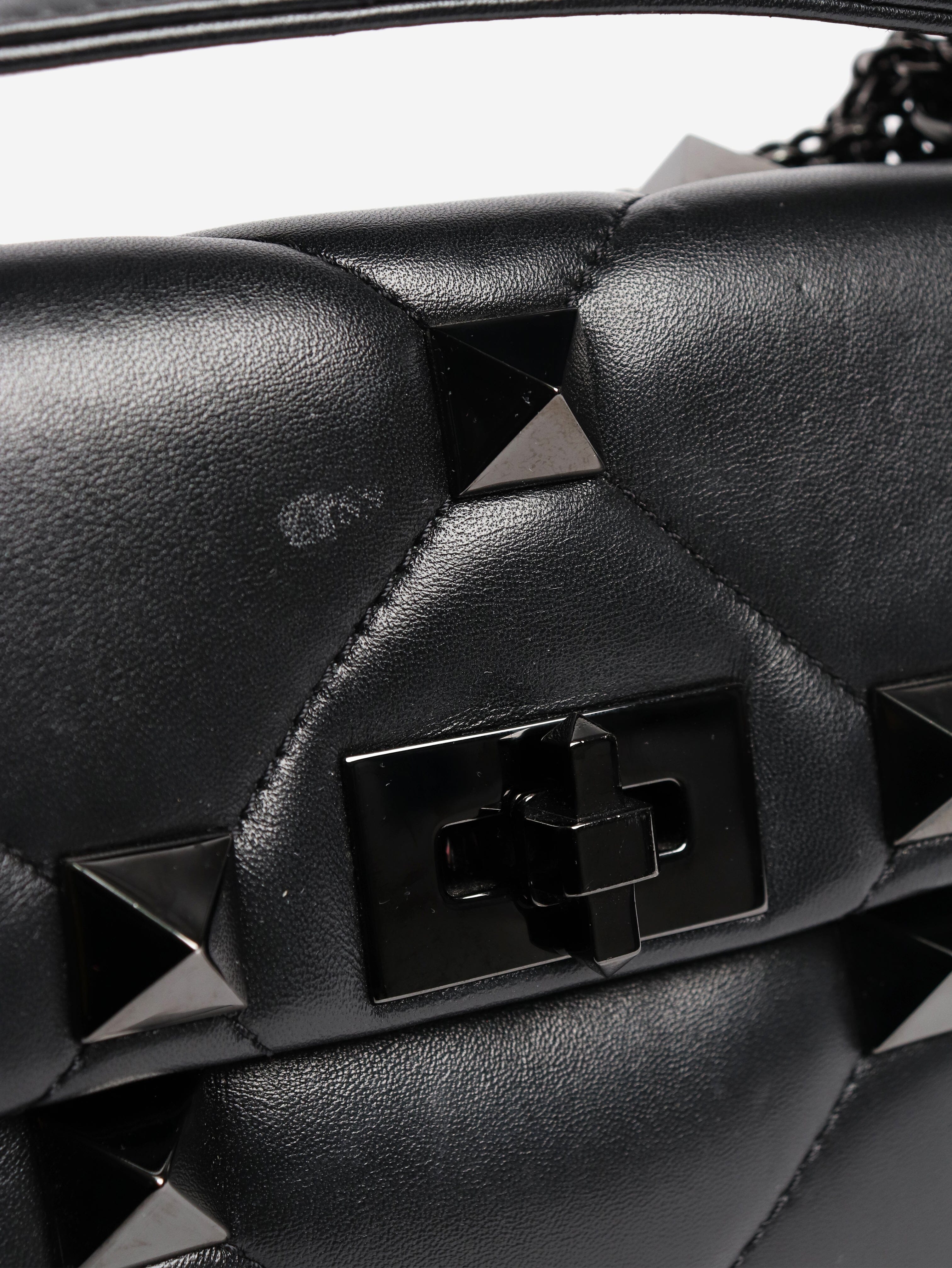 Black leather roman stud cross-body bag Cross-body Bags Valentino 