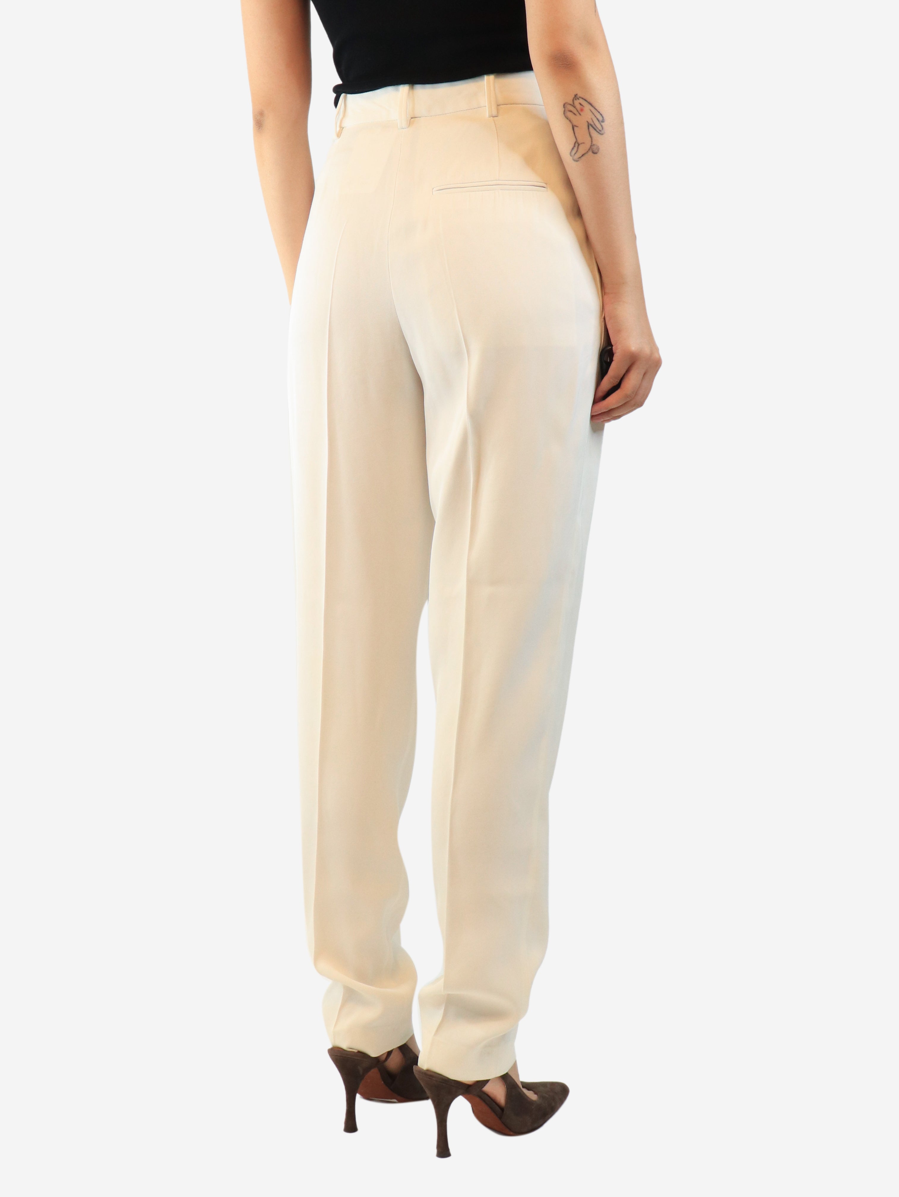Ivory pleated trousers - size UK 8