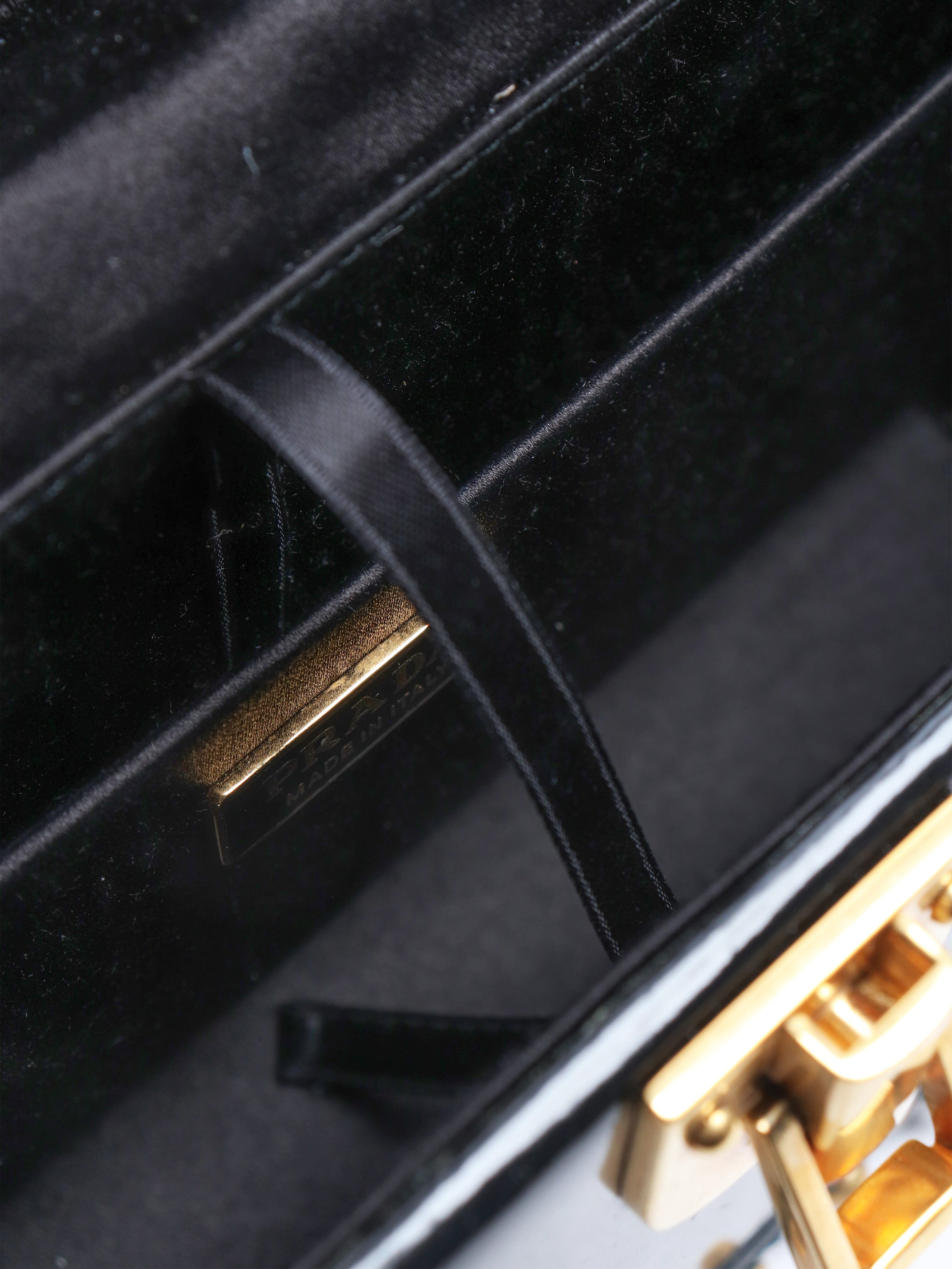 Black treasure trunk box Shoulder bags Prada 