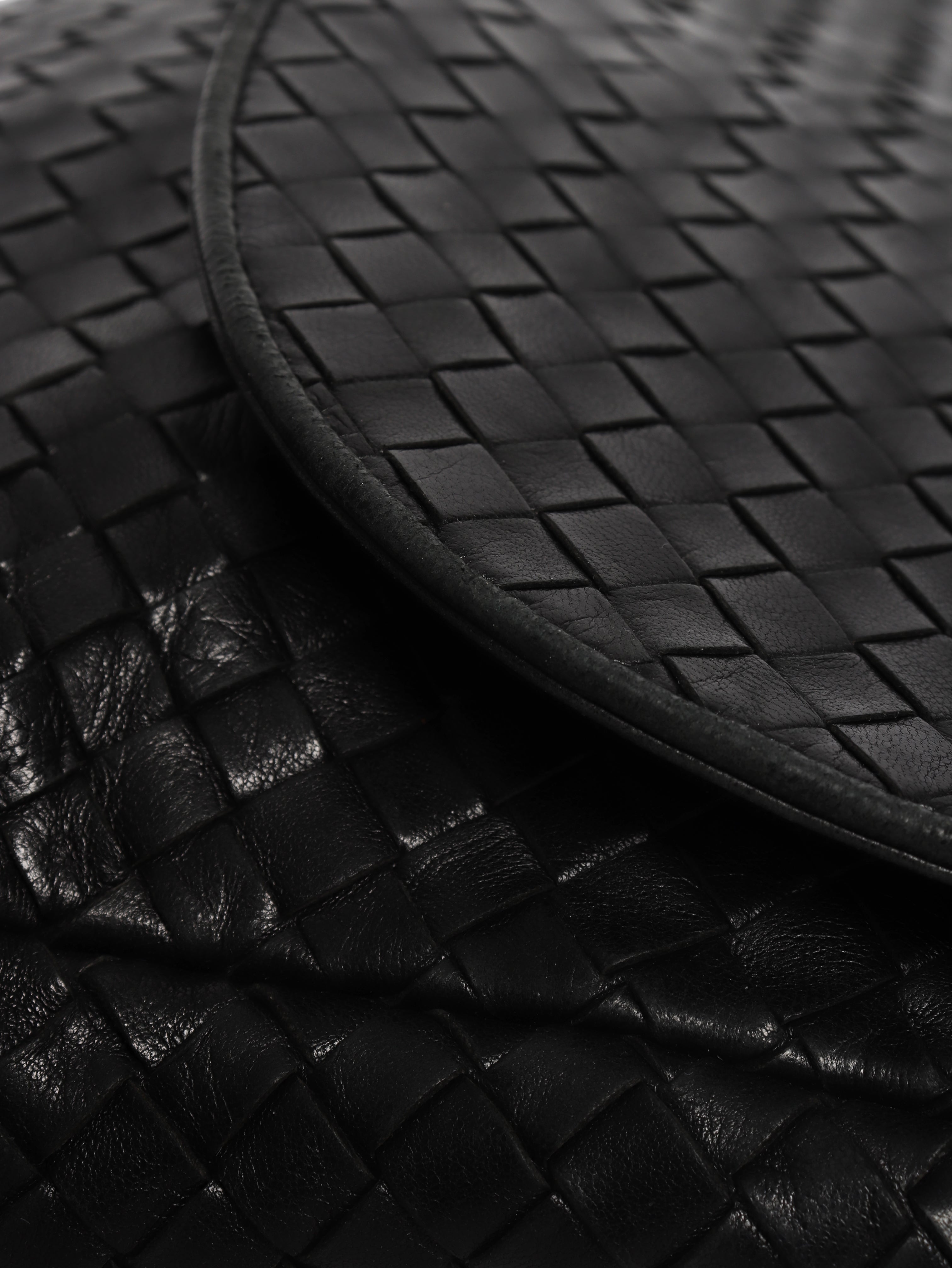 Black Intrecciato cross-body flap bag