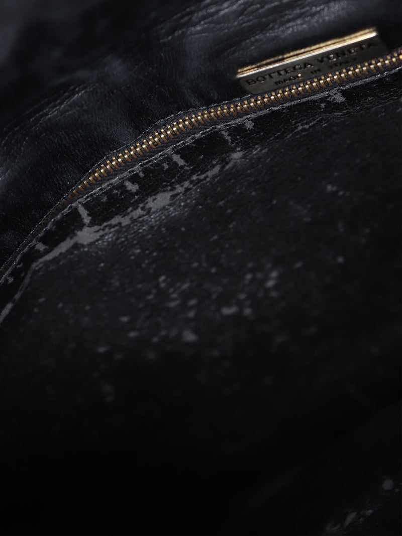 Black Intrecciato cross-body flap bag
