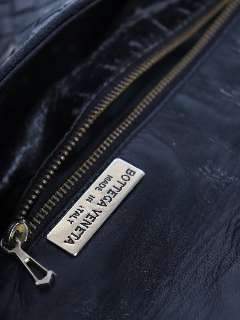 Black Intrecciato cross-body flap bag
