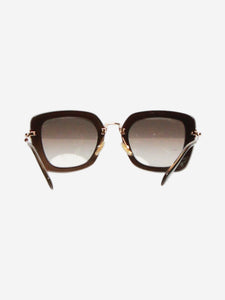 Miu Miu Black and gold gradient sunglasses