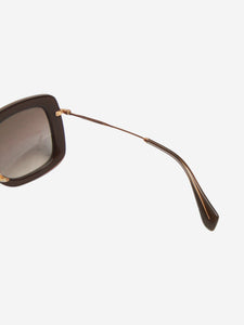 Miu Miu Black and gold gradient sunglasses