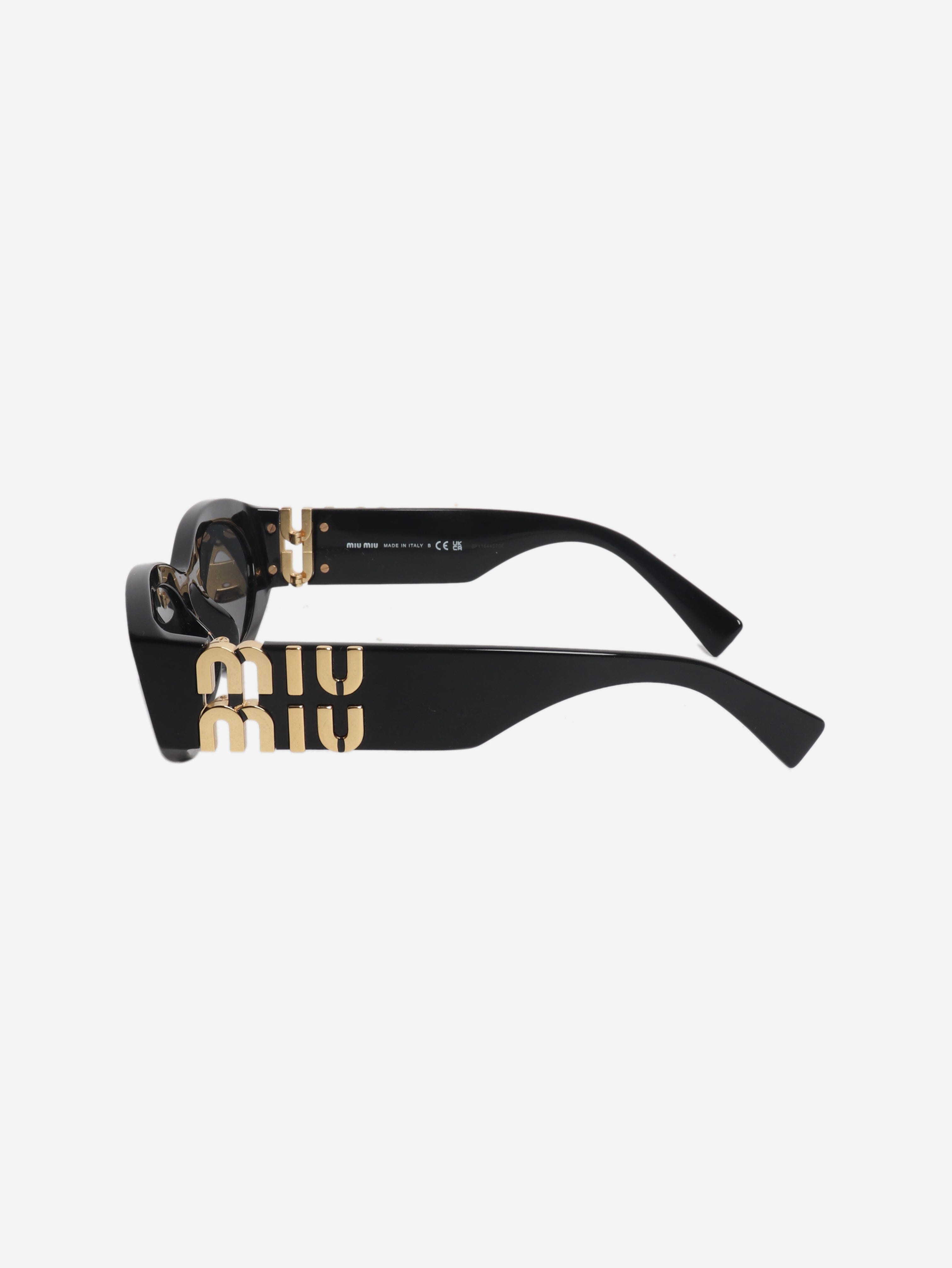 Black abd gold oval sunglasses