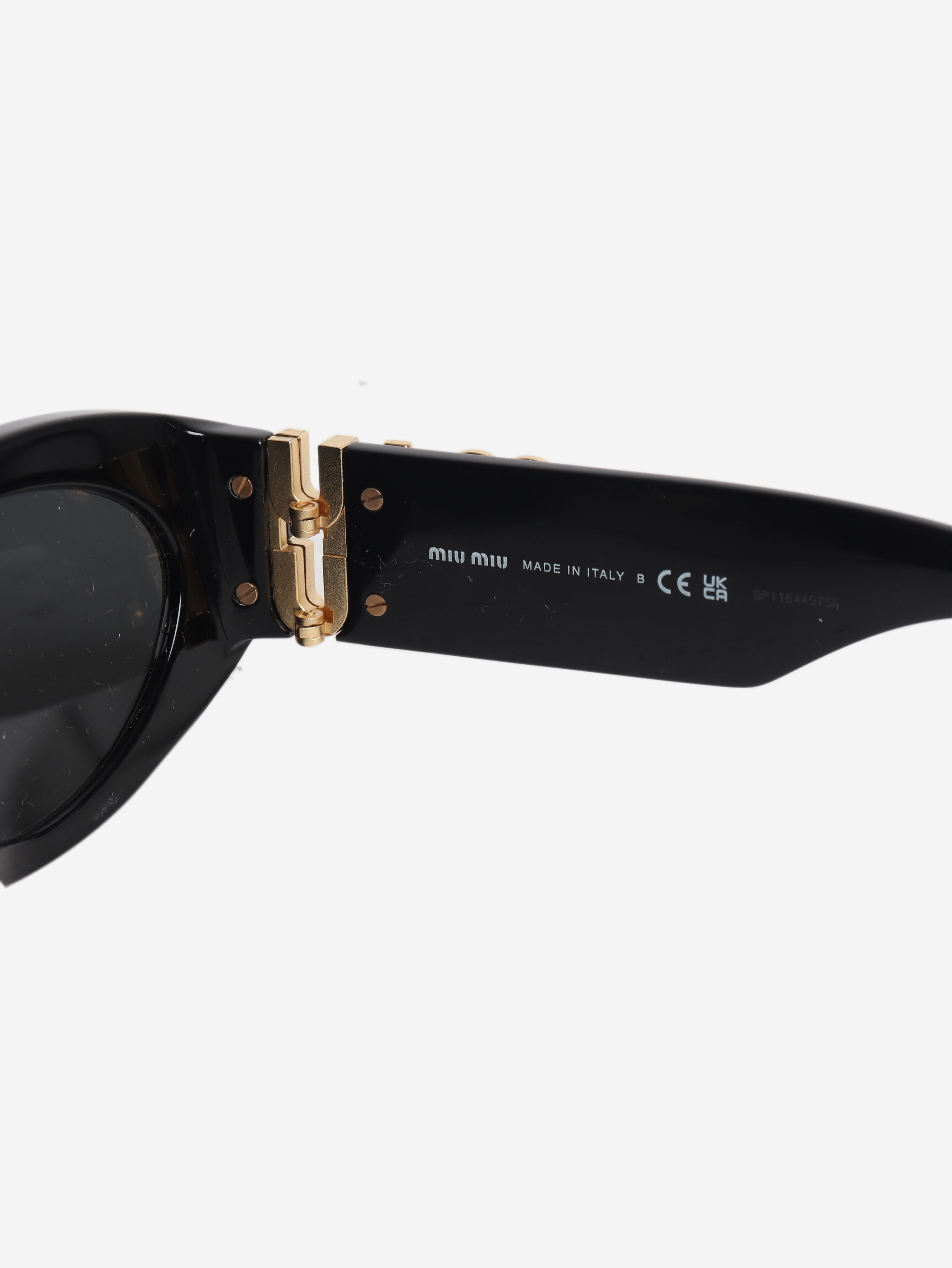Black abd gold oval sunglasses