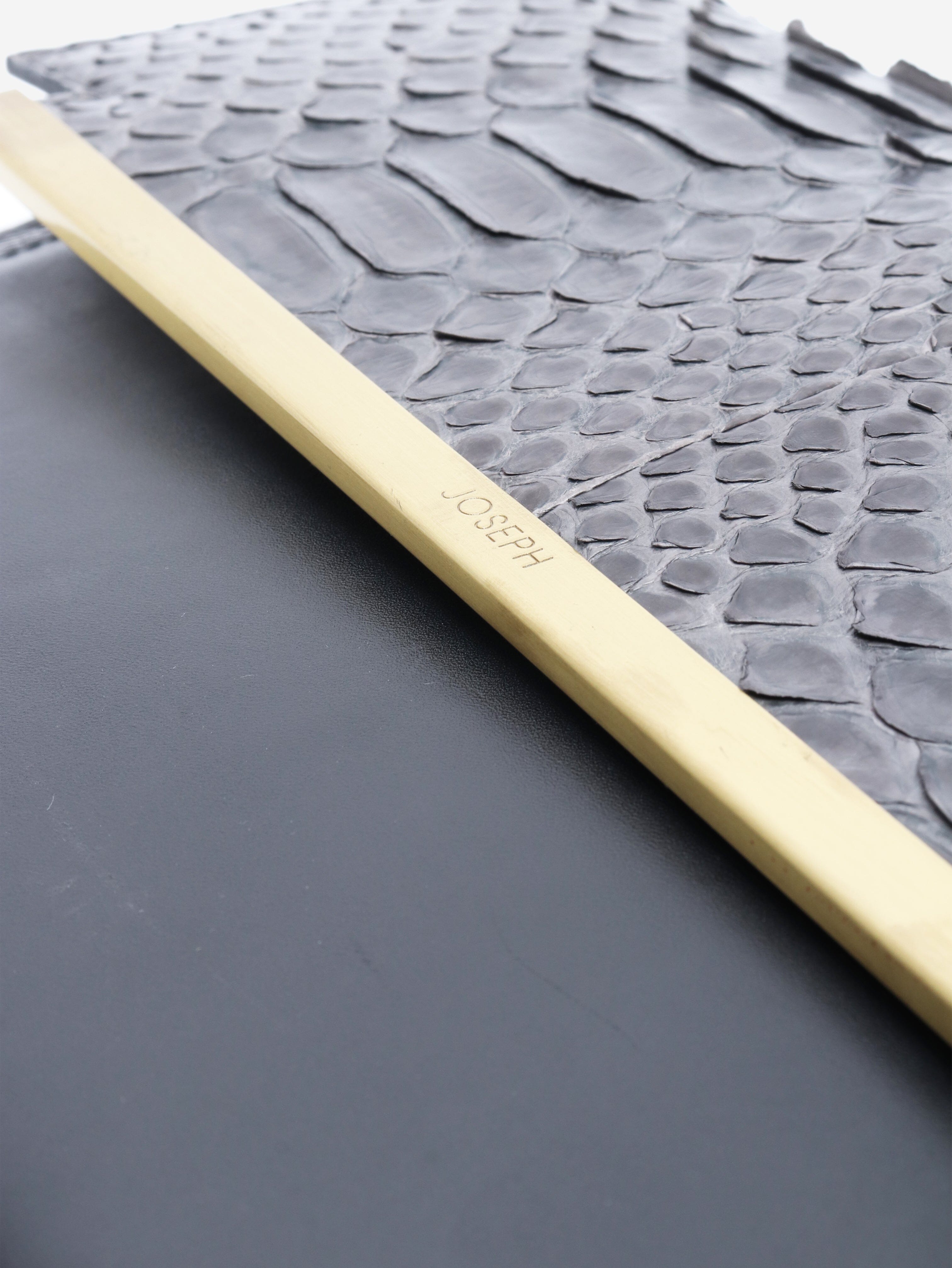 Grey snake-embossed leather clutch Clutch bags Joesph 