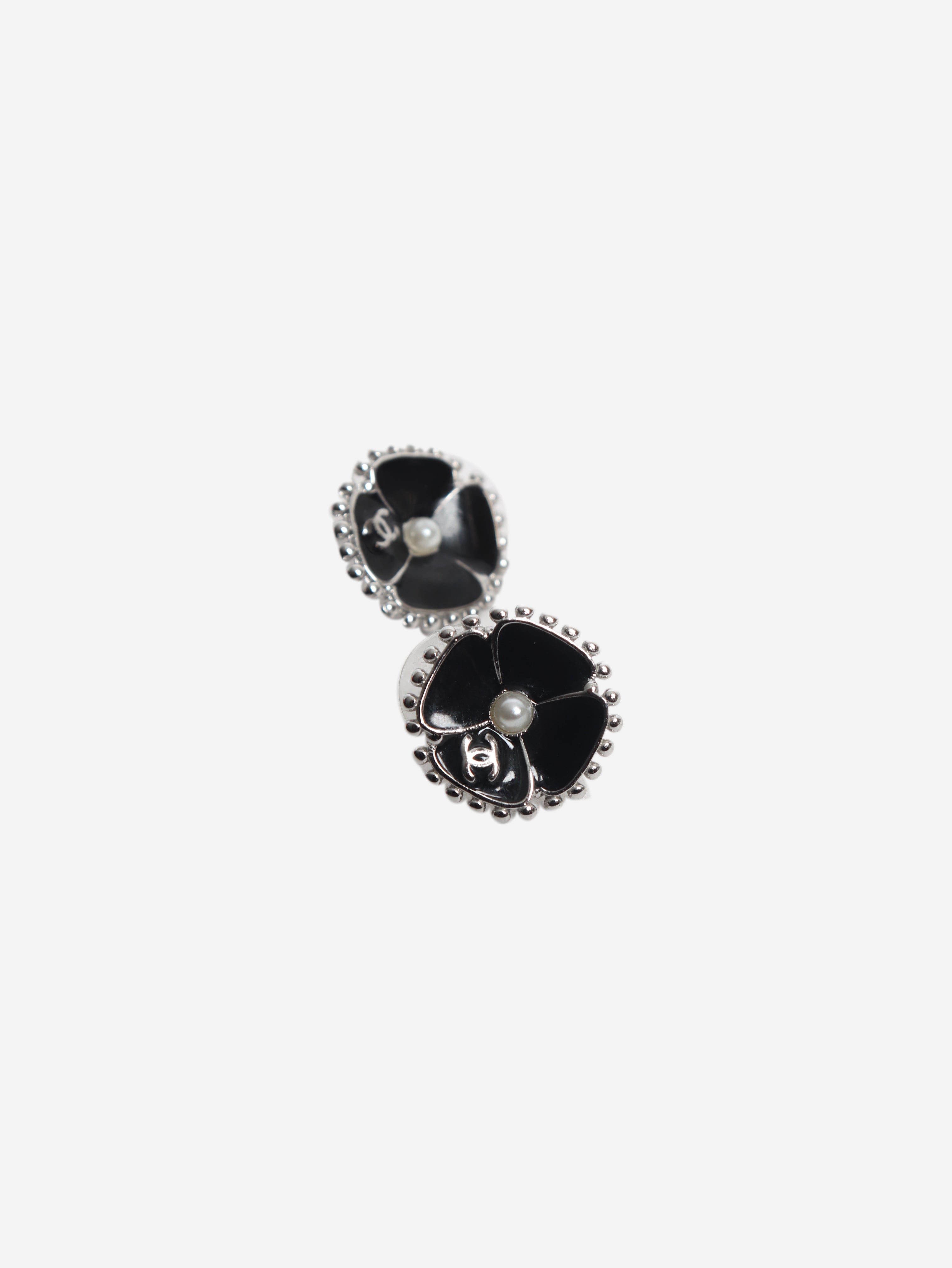 Black and silver camelia stud earrings