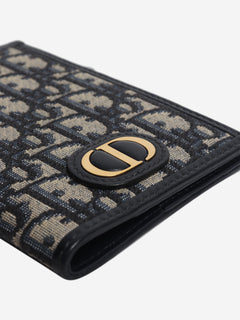 Blue Monogram passport holder