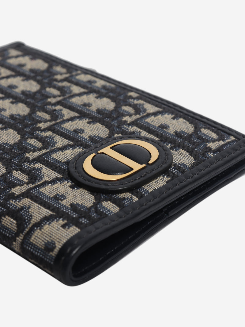 Blue Monogram passport holder
