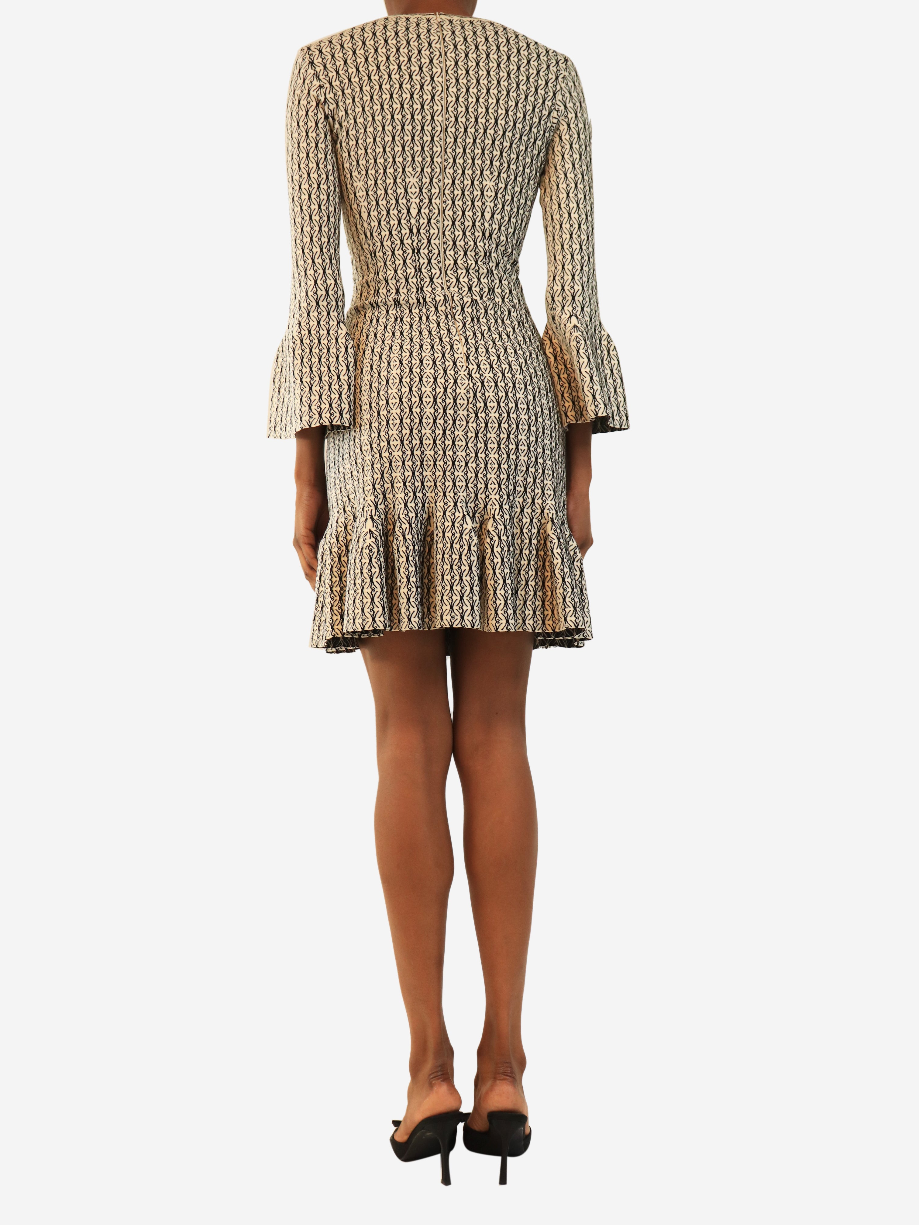 Black and white long sleeve knit mini dress - size UK 8
