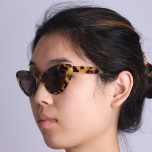 Miu Miu Brown tortoise shell cat-eye sunglasses
