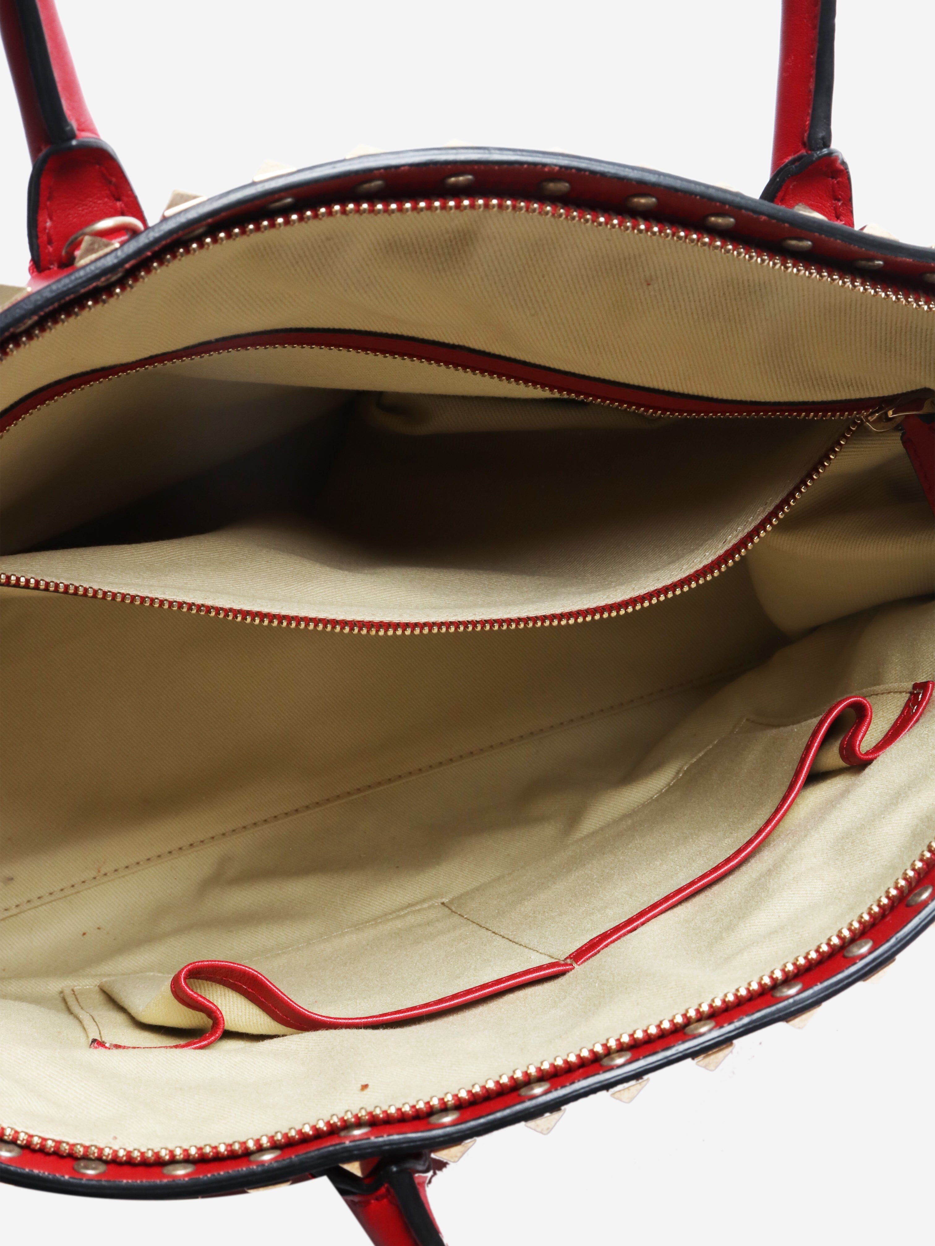 Red rockstud leather top handle bag Top Handle Bags Valentino 