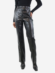 Nanushka Black faux-leather slit trousers - size S