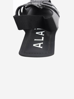 Black woven leather flat sandals - size EU 39 Flat Sandals Alaia 