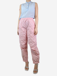 Alexander Wang Pink all-over flocked logo trousers - size M