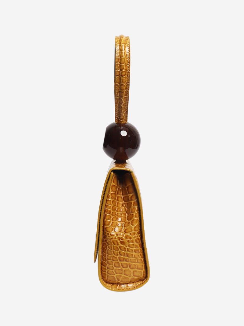 Mustard croc-embossed leather clutch bag