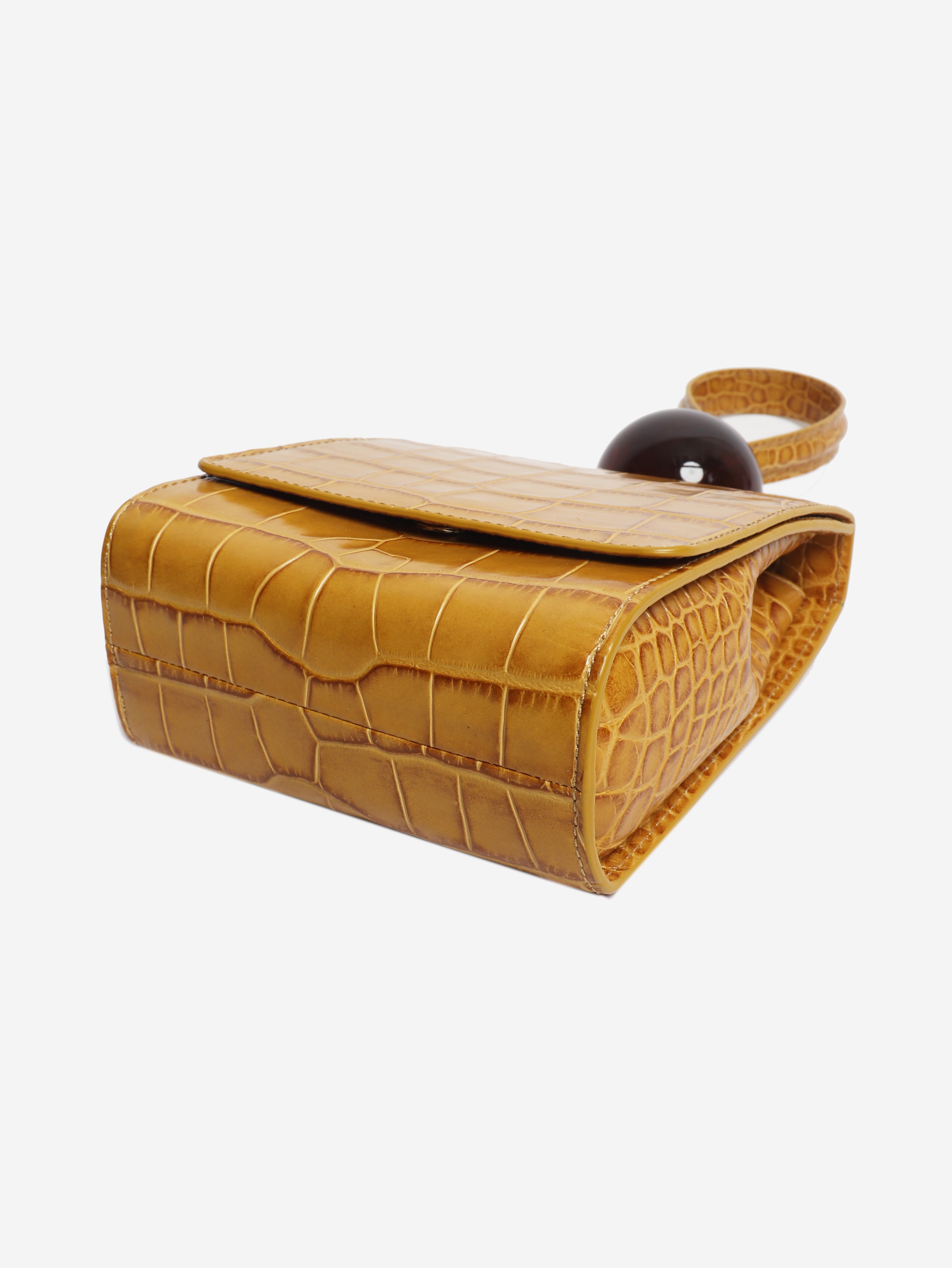 Mustard croc-embossed leather clutch bag