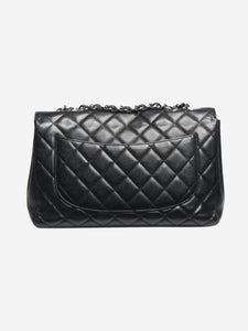 Chanel Black 2009 jumbo caviar Classic Single Flap bag