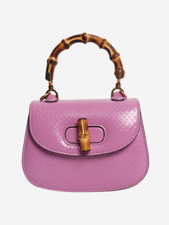 Purple bamboo handle leather bag