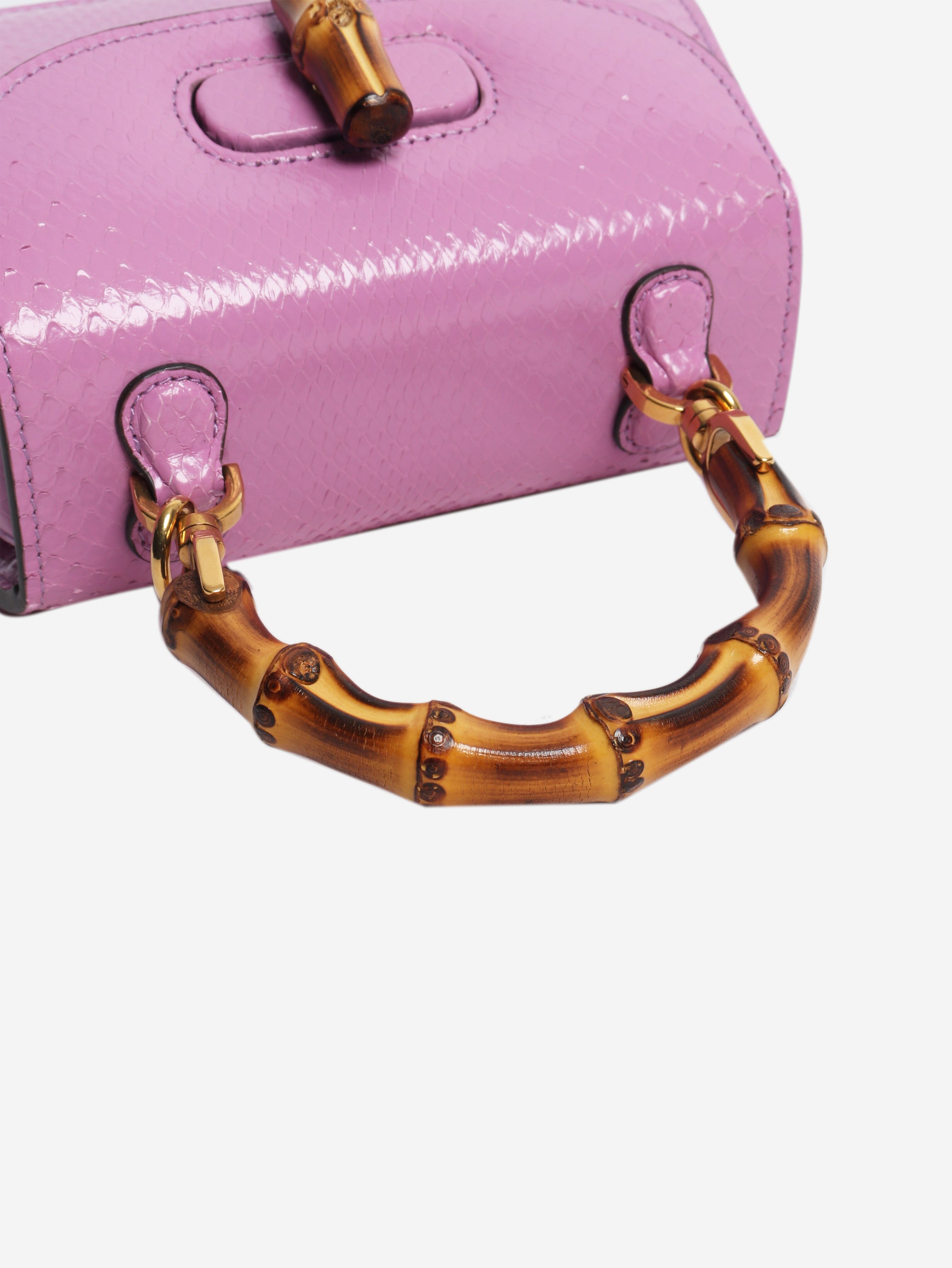 Purple bamboo handle leather bag