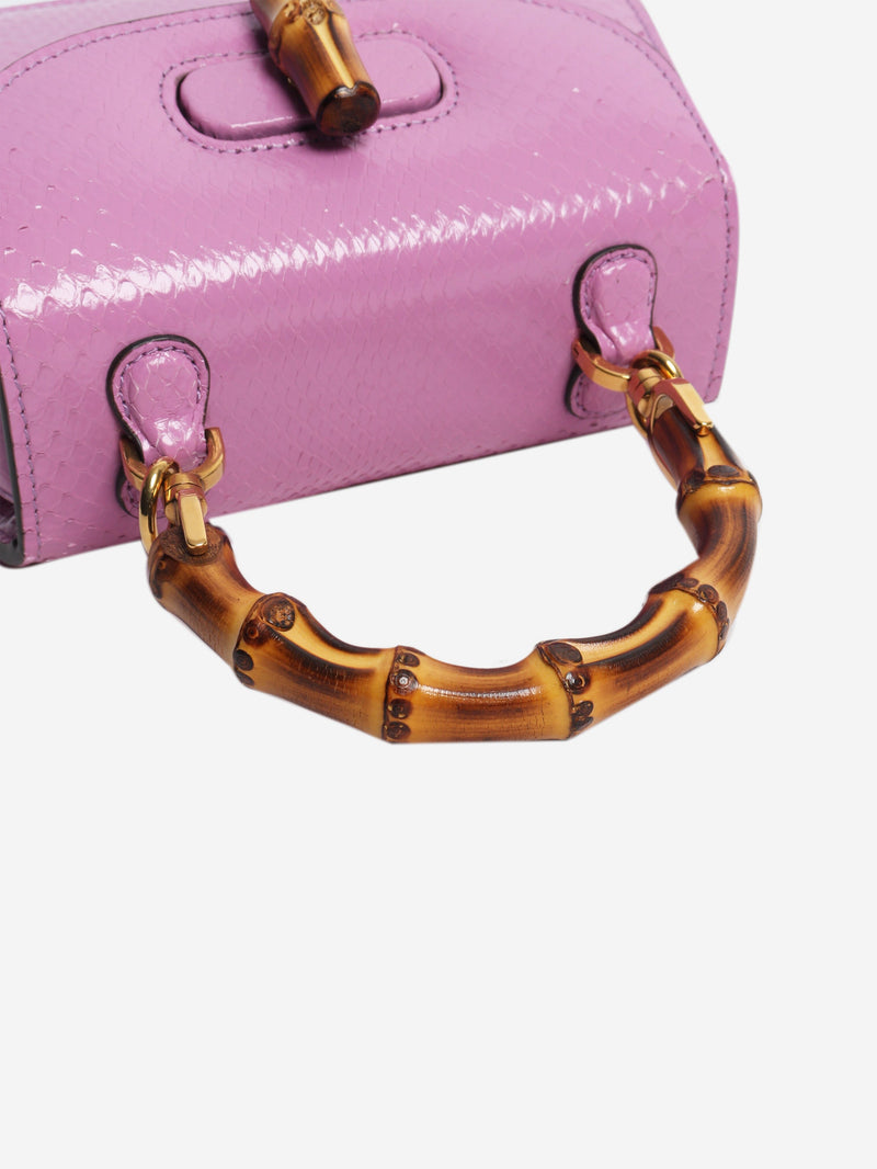Purple bamboo handle leather bag