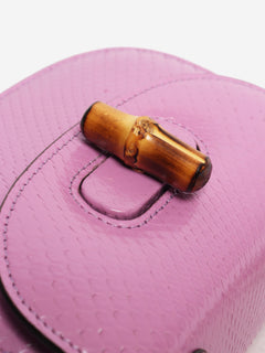 Purple bamboo handle leather bag