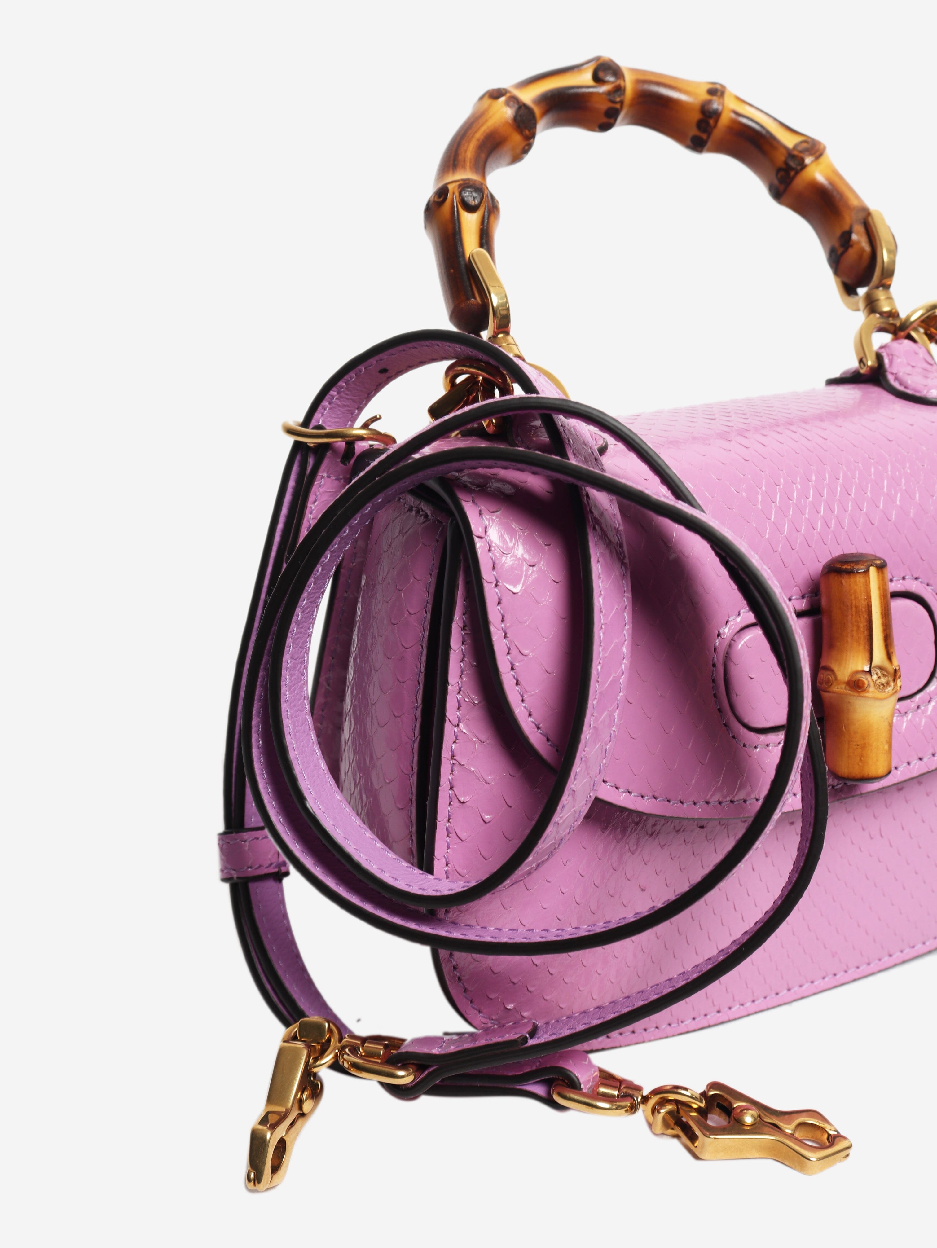 Purple bamboo handle leather bag