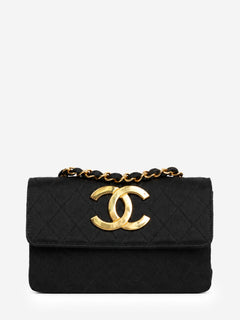 Black vintage 1986 satin quilted CC flap cross-body bag Shoulder bags Chanel 