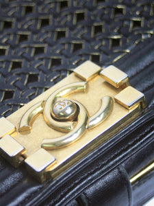 Chanel Black and gold 2014 medium lambskin Boy bag