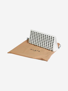 Alaia White triangle patterned leather clutch