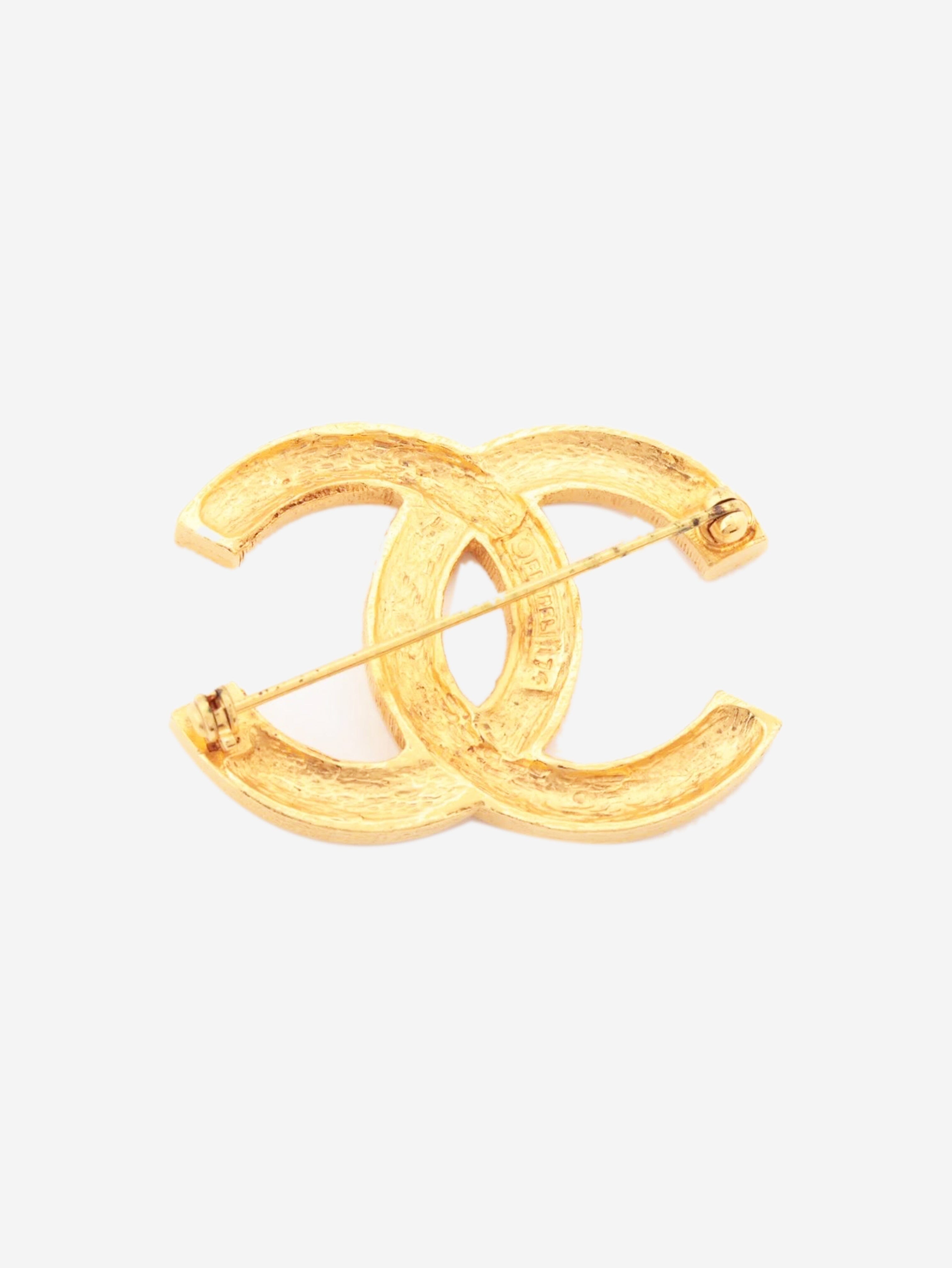 Gold rhinestone CC brooch