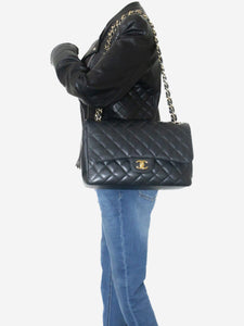 Chanel Black 2012 jumbo caviar Classic double flap bag