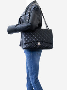 Chanel Black 2009 Caviar leather maxi Classic Single Flap bag